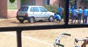 Students washing principal’s car